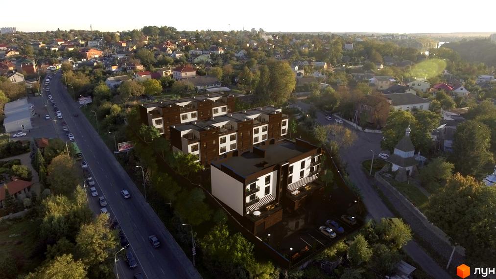 Сучасний житловий комплекс Sunny Village з коричневими фасадами та білими вікнами. Навколо комплексу зелені насадження та доглянута територія.