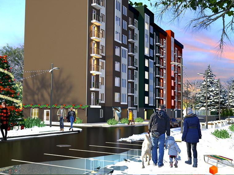 Житловий комплекс Гетьманський з фасадами різних кольорів та прибудинковою територією взимку.