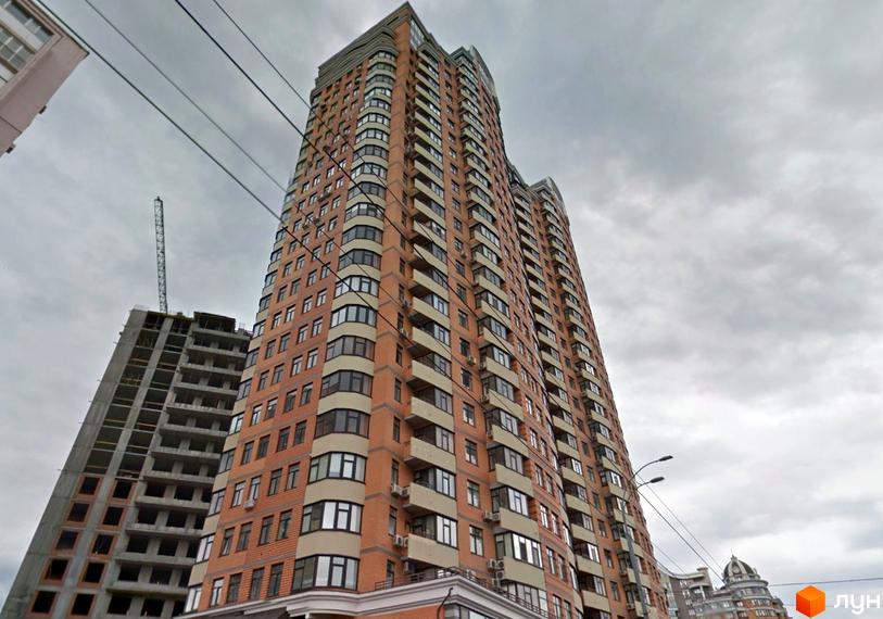 Житловий комплекс на бул. Лесі Українки, 7а, з висотним будинком та сучасною прибудинковою територією.