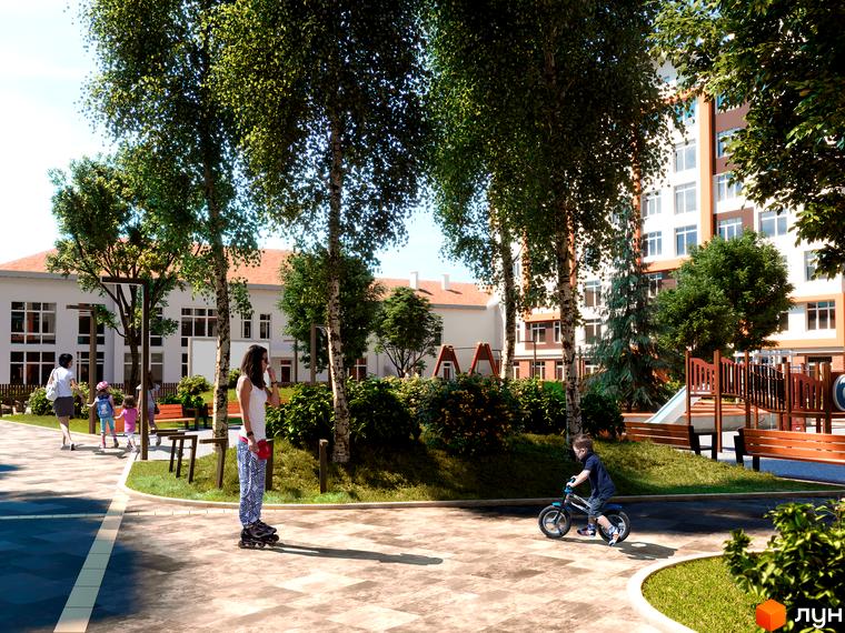Житловий комплекс Orange Park. Сучасна архітектура будівель та зелена прибудинкова територія з дитячим майданчиком та місцями для відпочинку.
