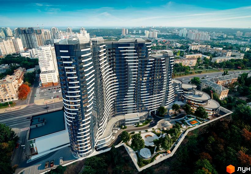 Житловий комплекс Aria - це сучасна новобудова з вигнутими фасадами та великою кількістю скління. На прибудинковій території розташовані зони відпочинку та дитячі майданчики.