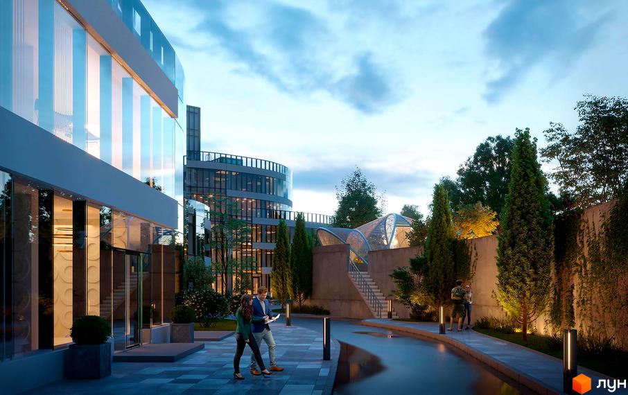 Житловий комплекс Aria з скляним фасадом та доглянутою прибудинковою територією з деревами та водою.