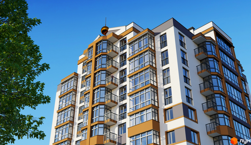 Зображення фасаду Житлового комплексу Капітал 2. Багатоповерховий будинок з великими вікнами та балконами на фоні блакитного неба.