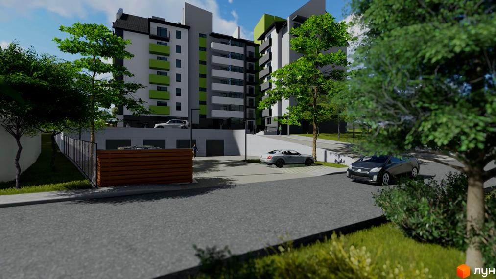 Житловий комплекс Комфорт Таун плюс з біло-сірими фасадами та зеленими акцентами. Навколо будинку дорога, парковка, зелені дерева.