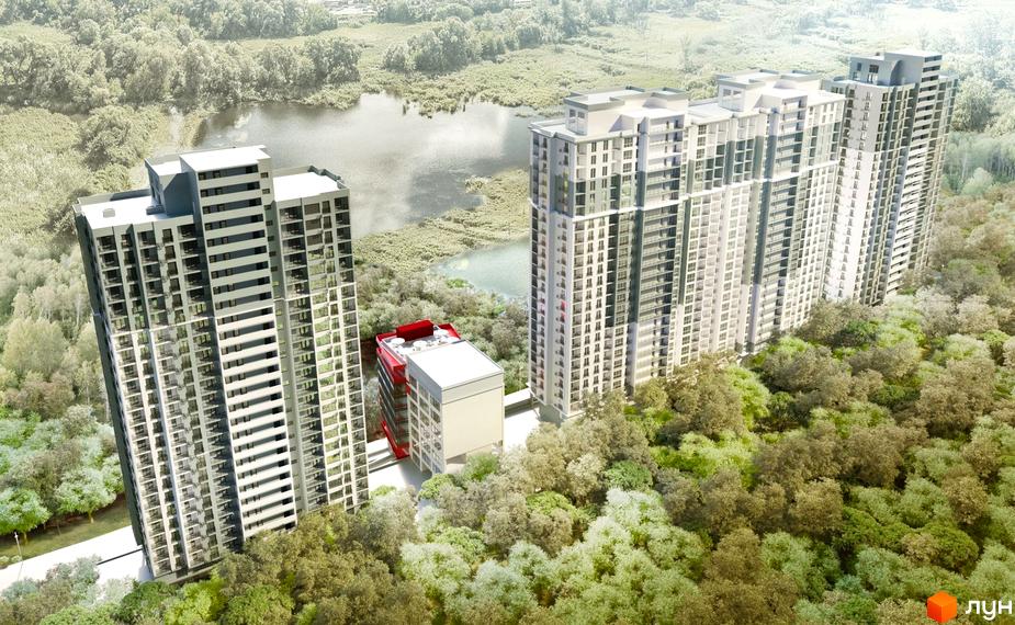 Вид на житловий комплекс Совські ставки з висоти пташиного польоту. Сучасні висотні будинки розташовані серед зелених дерев біля водойми.