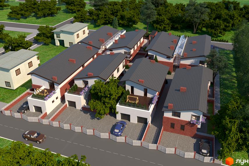 Вигляд зверху на котеджі з темно-сірими дахами та фасадами з білої і червоної цегли, з гаражами. Прибудинкова територія з бруківкою та зеленими насадженнями.