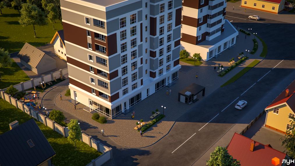 Житловий комплекс Новоградський: багатоповерховий будинок з сіро-коричневим фасадом. Прилегла територія має дитячий майданчик та озеленення.