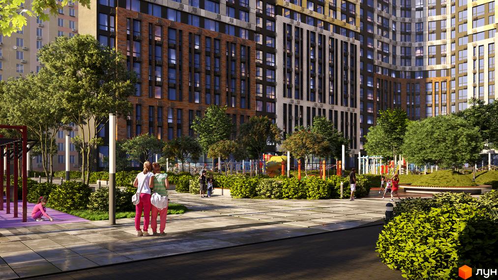 Житловий комплекс Art House з фасадами з цегли та великою кількістю вікон. На прибудинковій території розташовані дерева, кущі та дитячий майданчик.