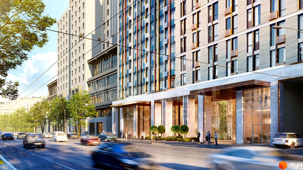 Житловий комплекс Montreal House з фасадом, оздобленим кольоровими панелями та великими вікнами. На вулиці перед будинком видно автомобілі та дерева.