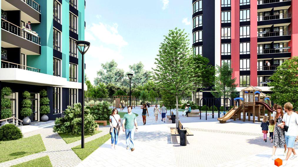 Новобудова ЖК Абрикосовий з яскравим фасадом та зеленою прибудинковою територією. Дитячий майданчик та місця для відпочинку.