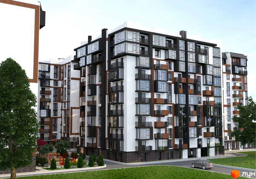 Зовнішній вигляд багатоповерхових будинків житлового комплексу Перлина Проскурова з великими вікнами та балконами. Прибудинкова територія з деревами та дитячим майданчиком.