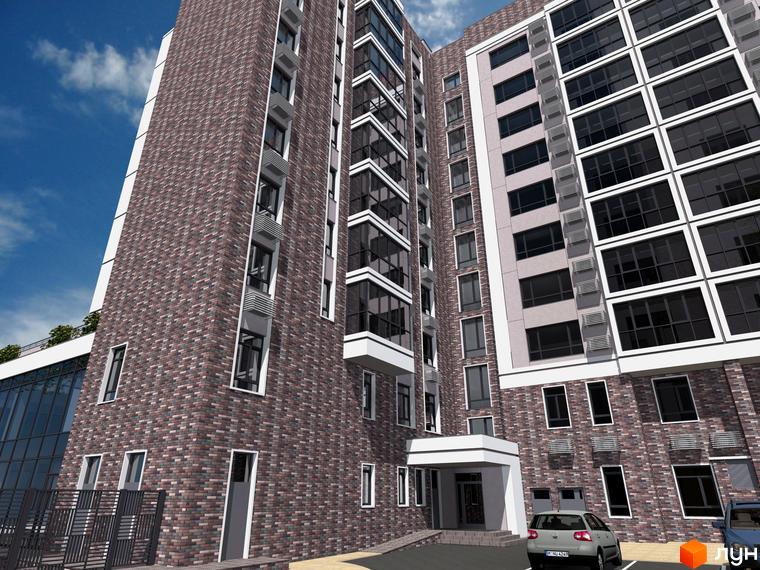 Зовнішній вигляд будинку ЖК Central Park з цегляним фасадом та великими вікнами. Біля будинку розташована прибудинкова територія з автомобілями.