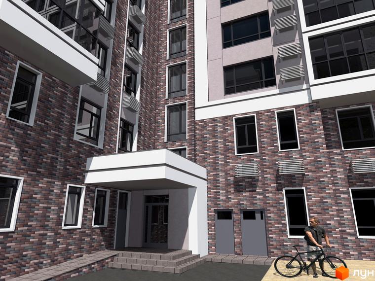 Фасад житлового комплексу Central Park з цегляним оздобленням та великими вікнами. Поруч розташована прибудинкова територія з велосипедом та людиною.