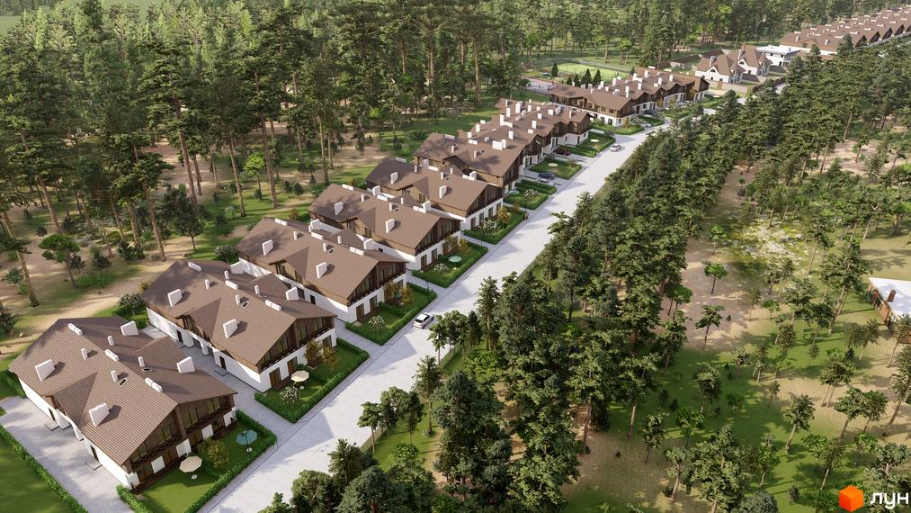 Вид зверху на Котеджне містечко Bruhsell: ряди будинків з коричневими дахами та білими фасадами, розташовані серед густого соснового лісу.