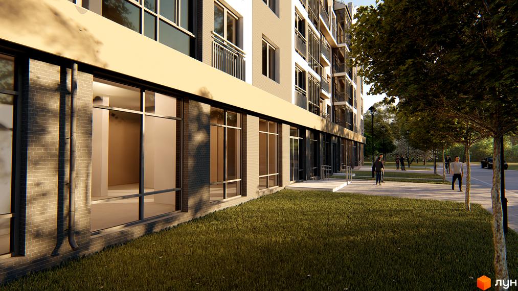 Зовнішній вигляд будівлі ЖК Сонцебуд з великими вікнами та газоном перед фасадом. На тротуарі видно людей та дерева.
