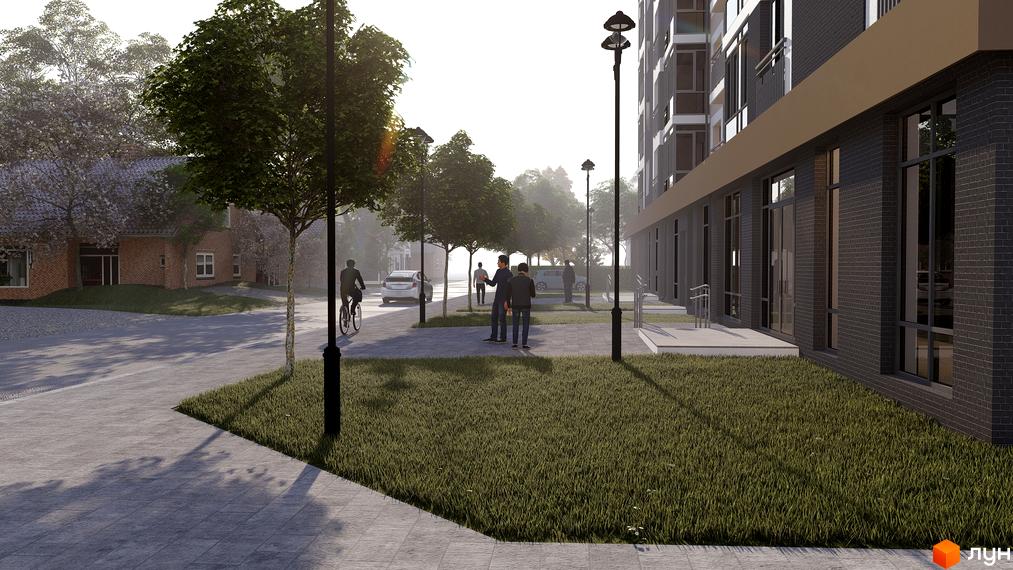 Зовнішній вигляд новобудови ЖК Сонцебуд з цегляним фасадом та прибудинковою територією з деревами та пішохідною зоною.