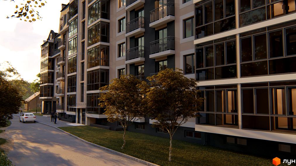 Зовнішній вигляд житлового комплексу Сонцебуд з великими вікнами та балконами, прибудинкова територія з дорогою та деревами.