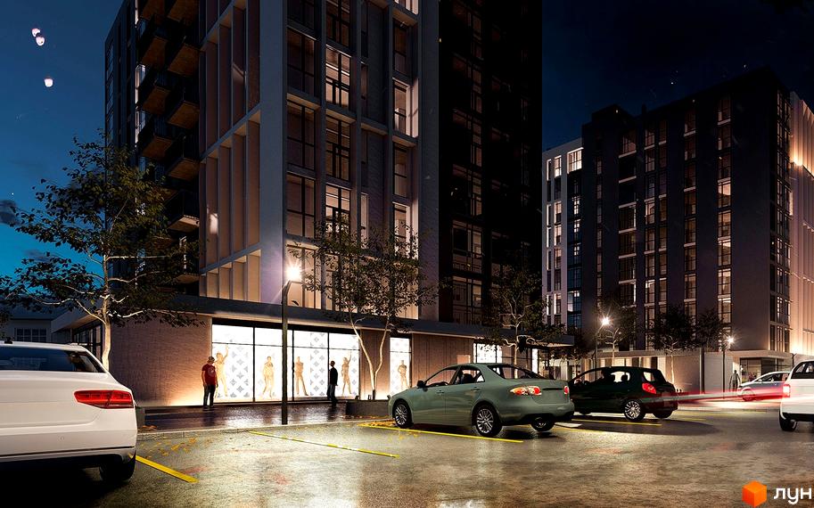 Висотна будівля ЖК Panorama з великими вікнами та підсвіткою. На території парковка з автомобілями та зелені насадження.