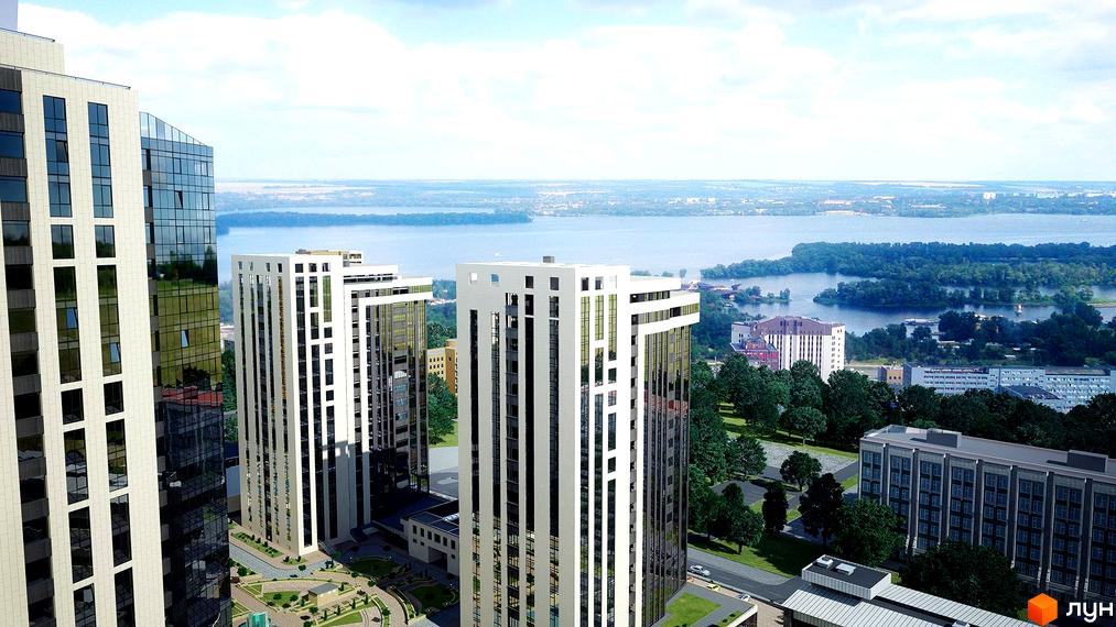 Високі білі будинки з великими вікнами на фоні річки та зелені. ЖК Панорама з доглянутою прибудинковою територією.