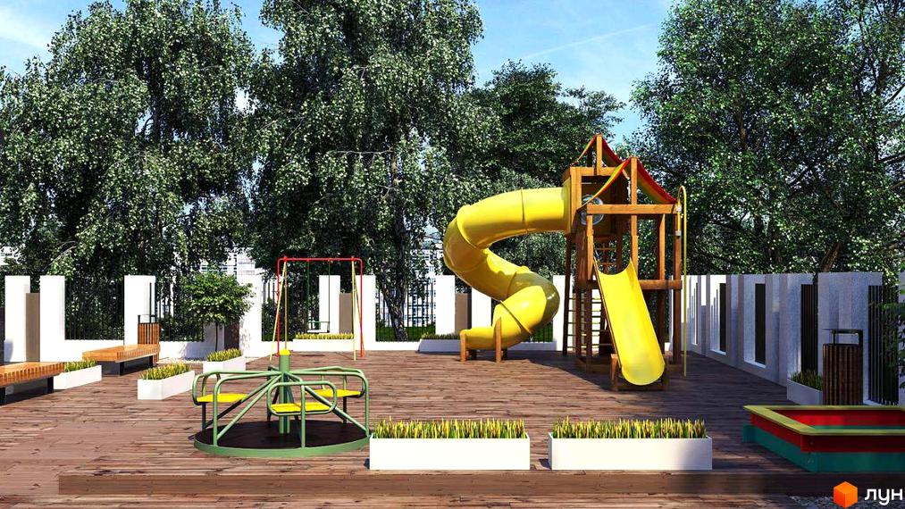 Дитячий майданчик у дворі клубного будинку 