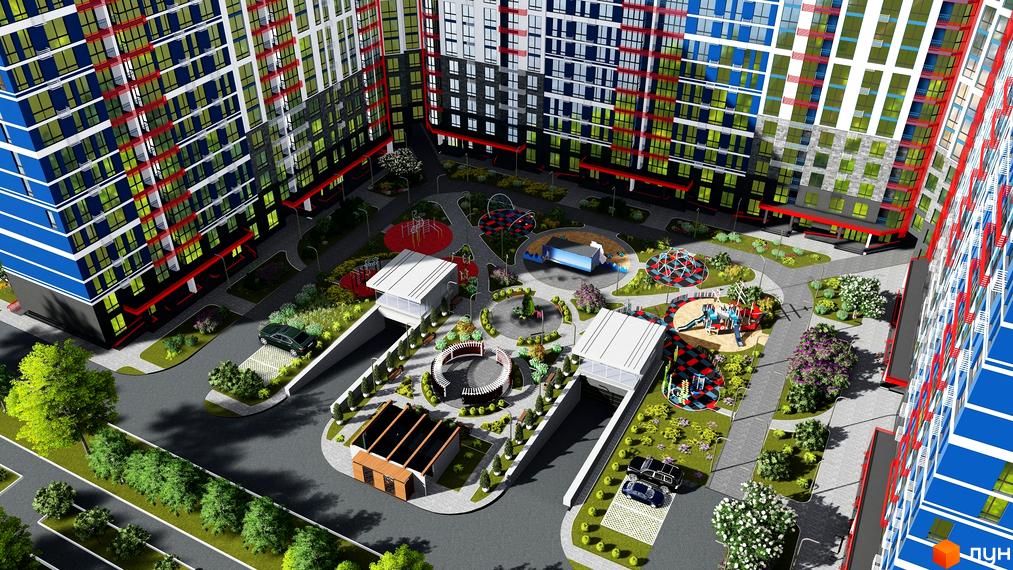 Житловий комплекс Причал 8 з яскравим фасадом та облаштованою прибудинковою територією з дитячими майданчиками та зонами відпочинку.