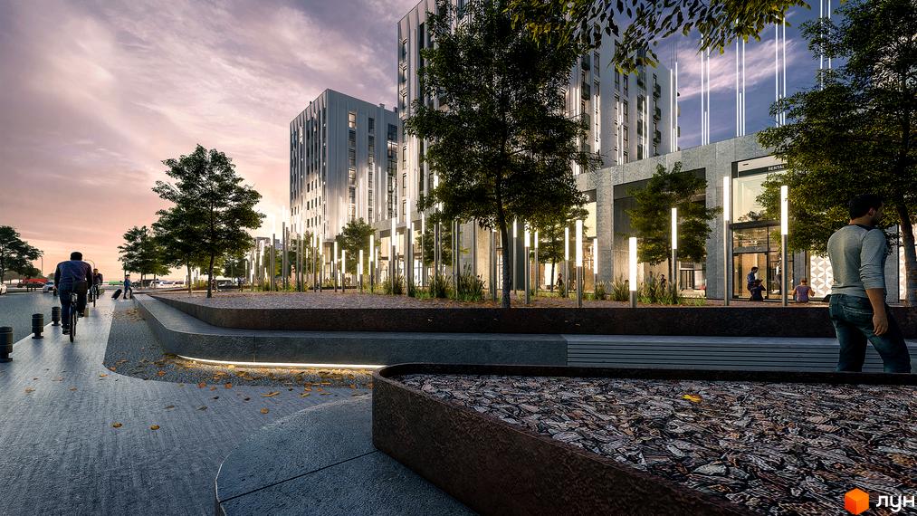 Житловий комплекс Ґорґани: фасади будівель з вертикальними елементами, освітлення та зелена зона з лавками та пішохідною доріжкою. Прибудинкова територія з деревами та місцями для відпочинку.