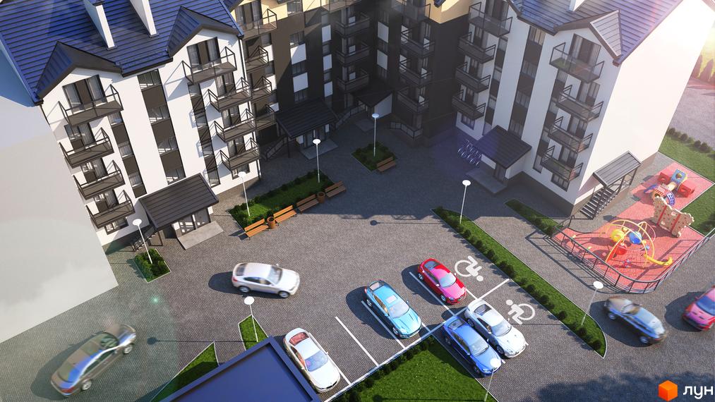 Житловий комплекс Дубенський Маєток: фасади будинків з балконами та прибудинкова територія з парковкою та дитячим майданчиком.