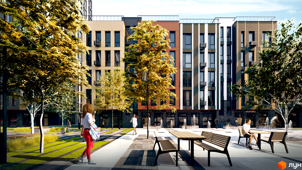 Житловий комплекс ATRIA CITY. TEREMKY. Сучасні фасади будівель та облаштована прибудинкова територія з деревами та зонами відпочинку.