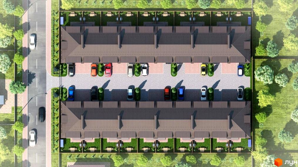 Вигляд зверху на таунхауси „Озерний“ з парковкою та зеленими насадженнями. На території розташовані місця для відпочинку.