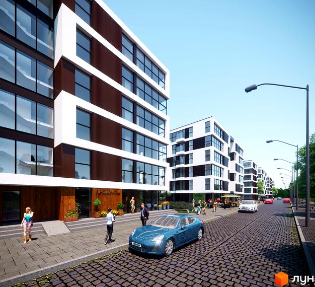 Житловий комплекс Grand Village з фасадами біло-коричневого кольору та великими вікнами. Територія комплексу з бруківкою та зеленими насадженнями.