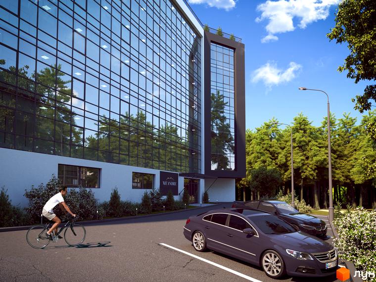 Апарт-комплекс Le Méandre з фасадом з дзеркального скла та прибудинковою територією з деревами та автомобілями.