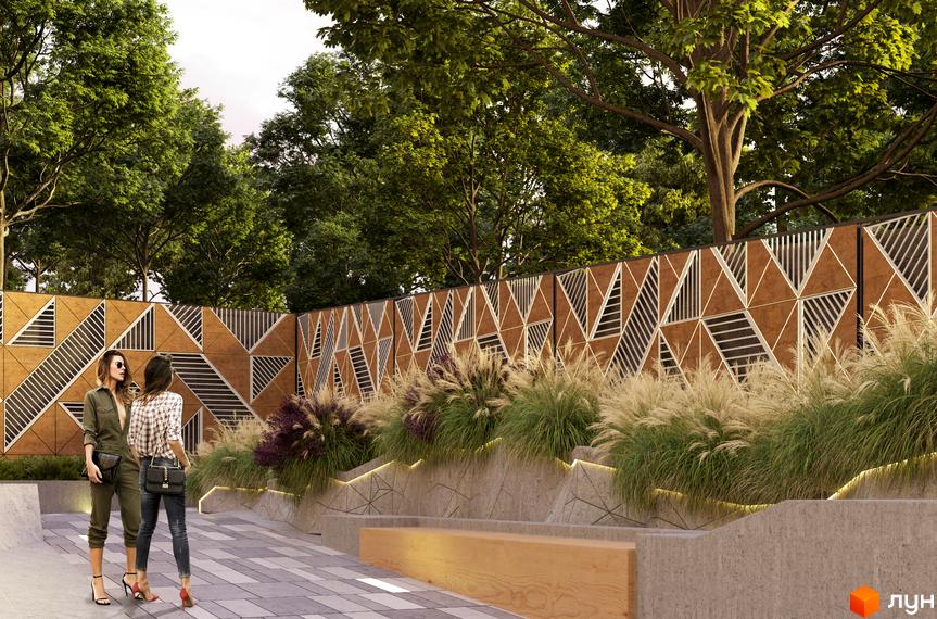 Декоративна стіна з геометричними візерунками та ландшафтний дизайн Житлового комплексу Fjord з зеленими насадженнями і підсвіткою.