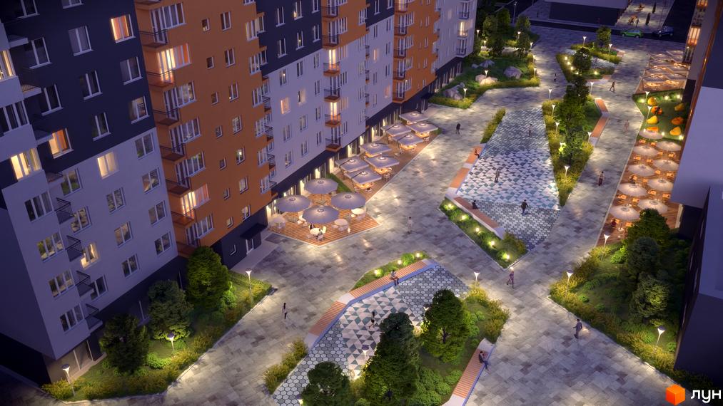 Житловий комплекс Сімейний COMFORT з оранжево-сірим фасадом та балконами. Прибудинкова територія з освітленням, деревами, зонами відпочинку та літніми терасами.