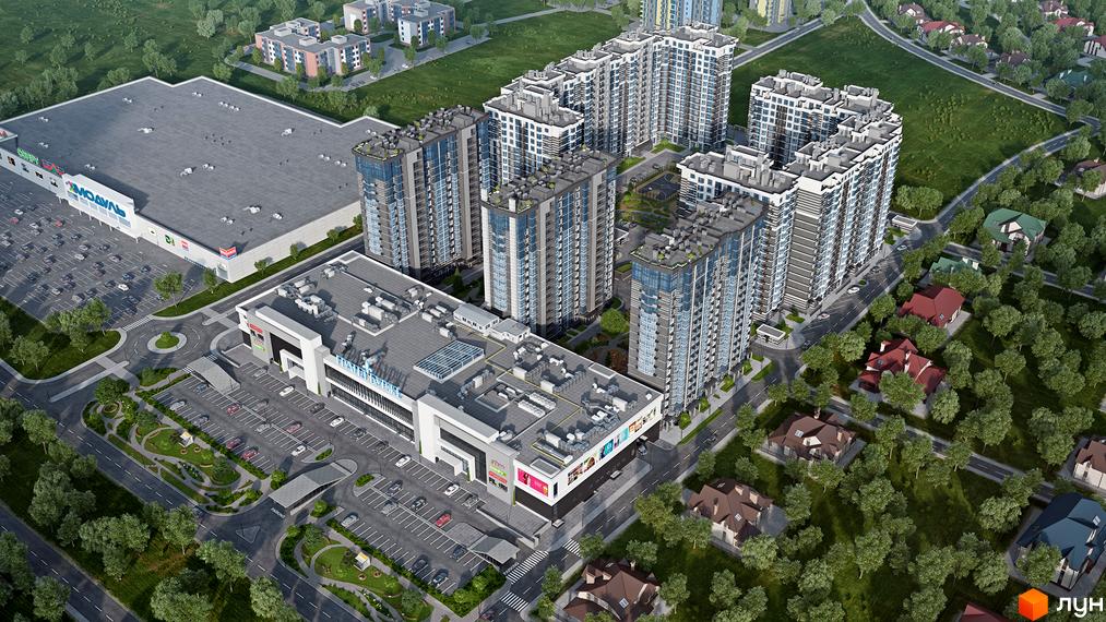 Зображення Житлового комплексу Grand Bourget з висоти пташиного польоту. На фото багатоповерхові будинки та торговий центр з паркінгом.