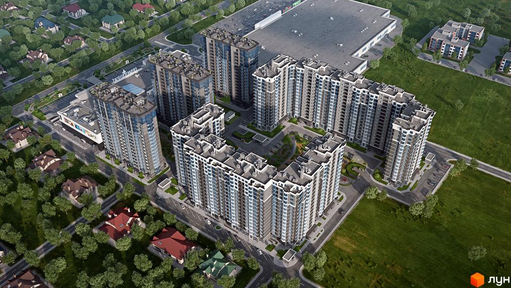 Житловий комплекс Grand Bourget з висоти пташиного польоту. Вигляд на багатоповерхові будинки та зелені насадження на прибудинковій території.