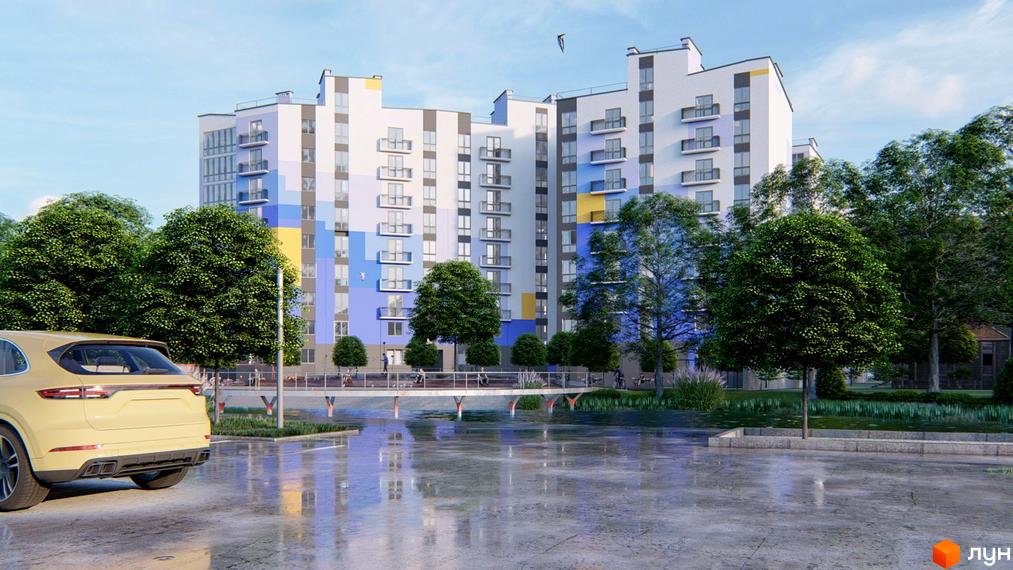 Багатоповерховий будинок Житлового комплексу Столичний Квартал з білим фасадом та синьо-жовтими вставками. Прибудинкова територія з деревами, мостом та парковкою.