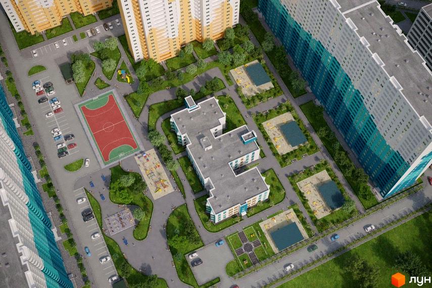 Житловий комплекс Одеський бульвар з висотними будинками світлих відтінків та бірюзовими акцентами. На території є спортивні майданчики, дитячі ігрові зони та зелені насадження.