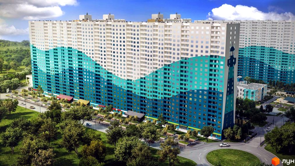 Житловий комплекс Одеський бульвар. Високоповерховий будинок з хвилястим дизайном фасаду у бірюзових тонах. На прибудинковій території зелені насадження та дорога з круговим рухом.