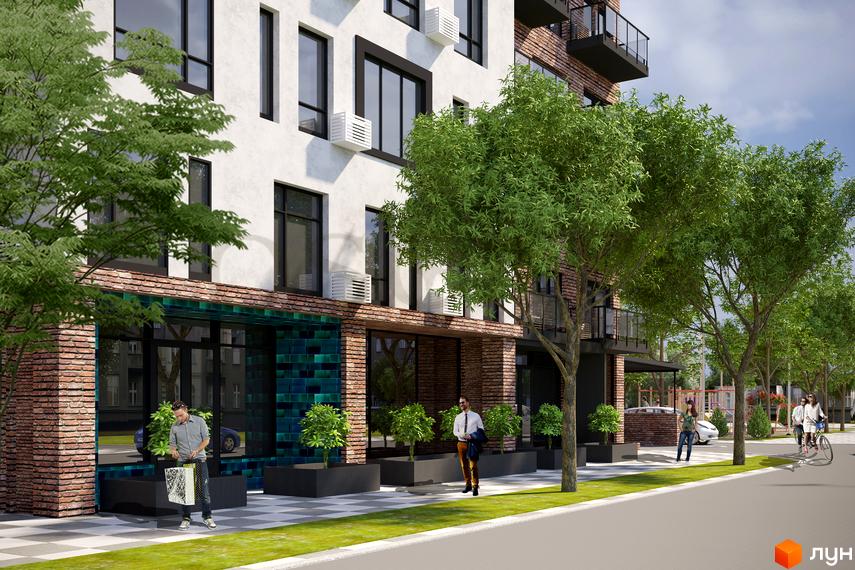 Зображення фасаду Новобудови Оскар з облицюванням з цегли та великими вікнами. Навколо будинку зелені насадження та тротуар.