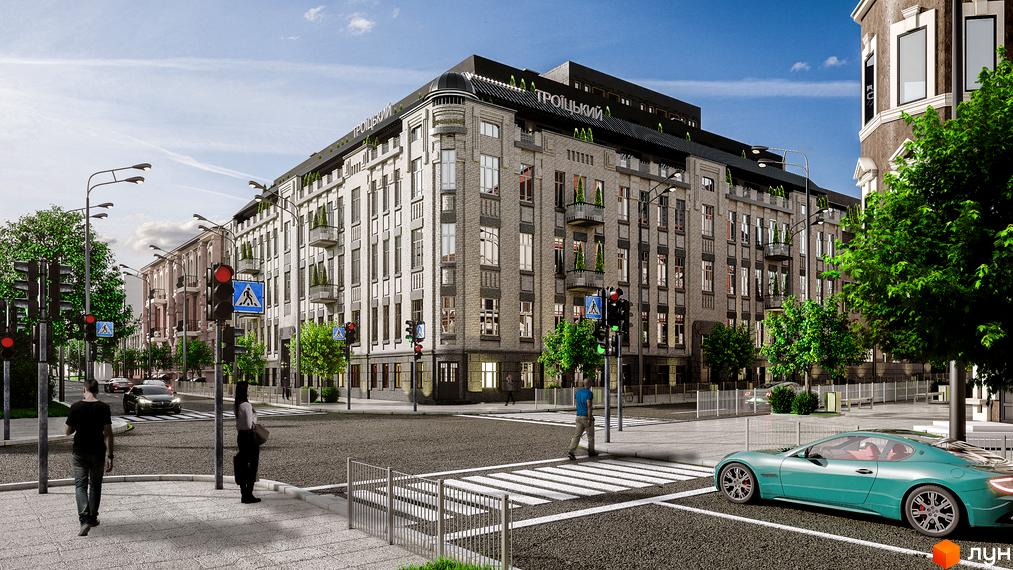 Житловий комплекс Троїцький. Архітектура будівлі з великою кількістю вікон та балконів. На прибудинковій території зелені насадження, пішохідний перехід та автомобіль.