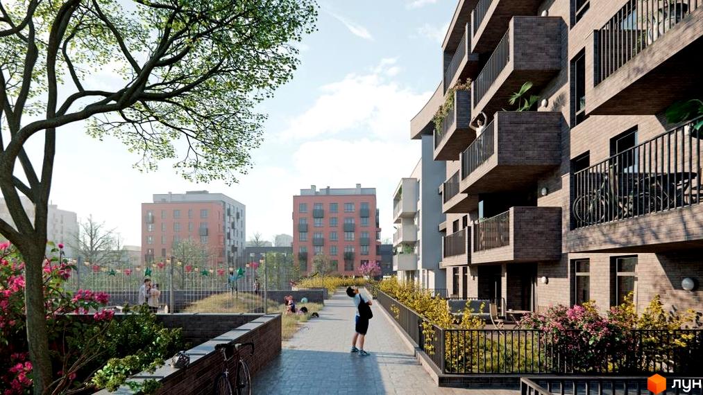 Житловий комплекс Rubicon Premium - це сучасна архітектура з балконами та зеленою прибудинковою територією. На зображенні видно будівлі та зону відпочинку для мешканців.