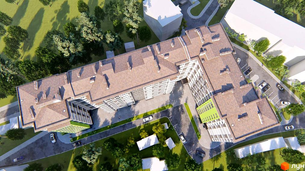 Зовнішній вигляд житлового комплексу Пасічнянський Двір з висоти пташиного польоту, що демонструє його архітектуру та прибудинкову територію з парковкою та зеленими насадженнями.