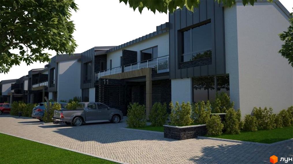 Зовнішній вигляд клубного містечка „Троянда на Граніті“ з автомобілями та зеленими насадженнями. Будинки мають сучасний дизайн з великими вікнами та балконами.