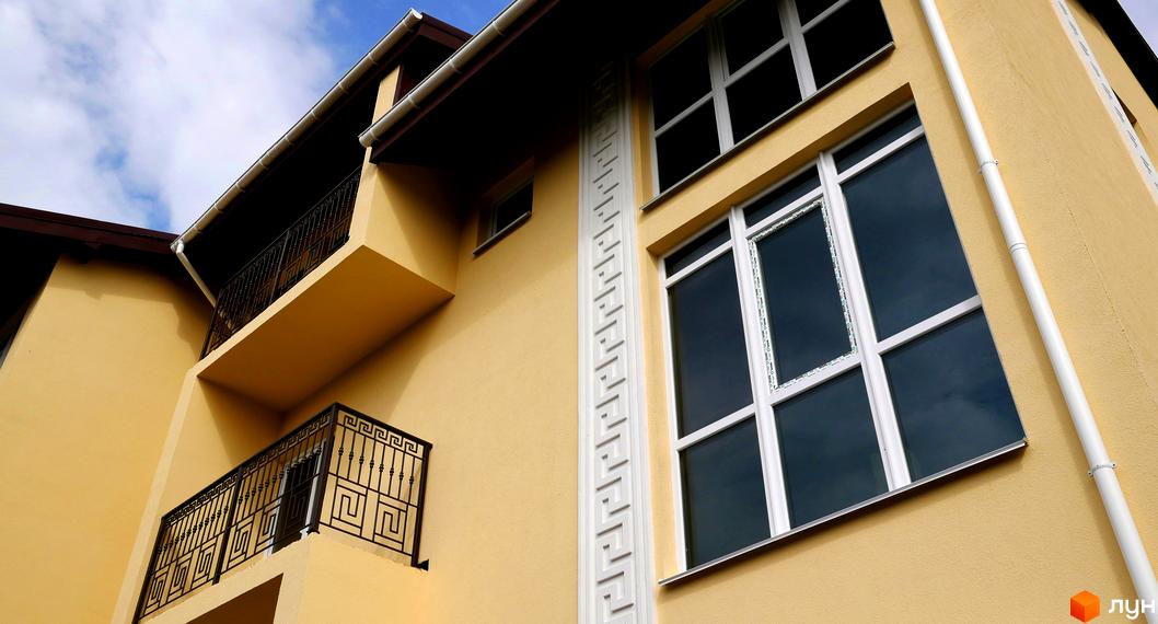 Зовнішній вигляд будинку в Таунхаус