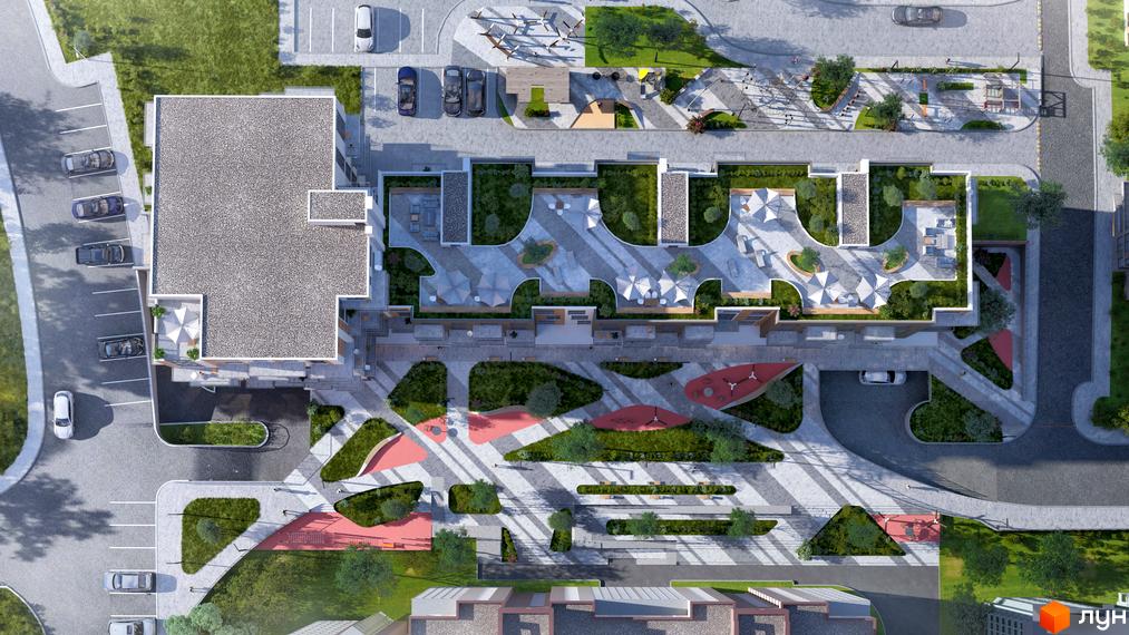 Вид зверху на житловий комплекс OBRIY3 з зеленими зонами, зонами відпочинку та дитячими майданчиками. На території комплексу розташовані сучасні будівлі та доглянута прибудинкова територія.