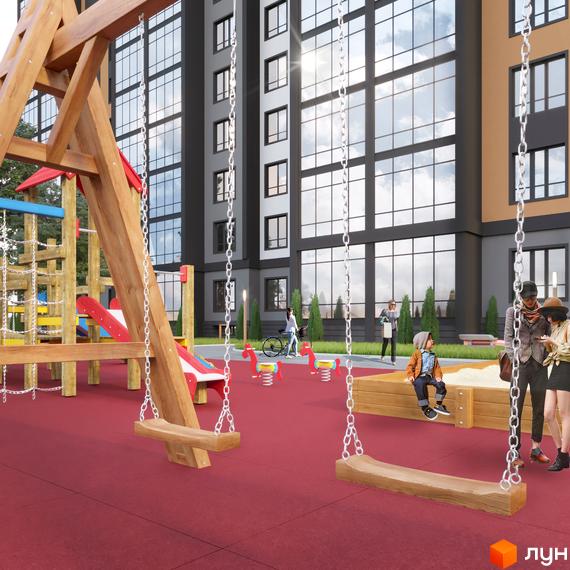 Фасад багатоповерхового будинку Житлового комплексу Дім з великими вікнами. На прибудинковій території облаштовано дитячий майданчик з гойдалками та ігровими елементами.