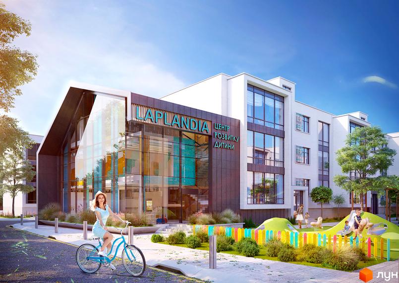 Комплекс LAPLANDIA з великою скляною фасадною частиною та дитячим майданчиком із різнокольоровою огорожею. На передньому плані дівчина на велосипеді.