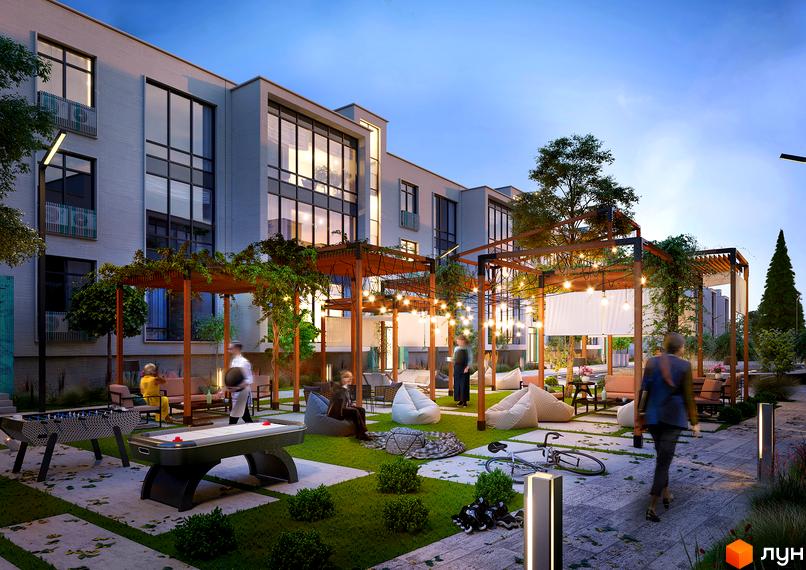 Зовнішній вигляд новобудови ЖК Ібіс з великими вікнами та прибудинковою територією з зонами відпочинку та іграми.