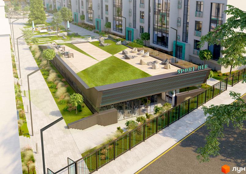 Житловий комплекс Ібіс: сучасна архітектура та зелена прибудинкова територія з місцями для відпочинку. На фасаді будівлі розміщено напис 