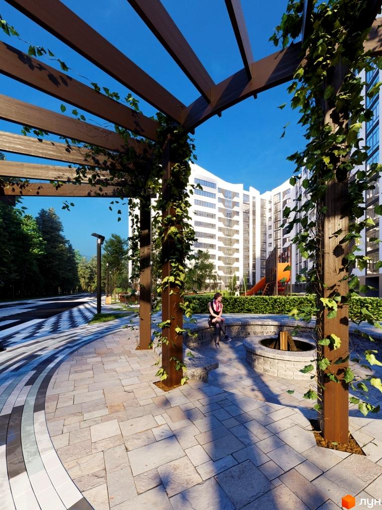 Житловий комплекс Авіатор. Зелена зона відпочинку з альтанкою та дитячим майданчиком біля багатоповерхового будинку.